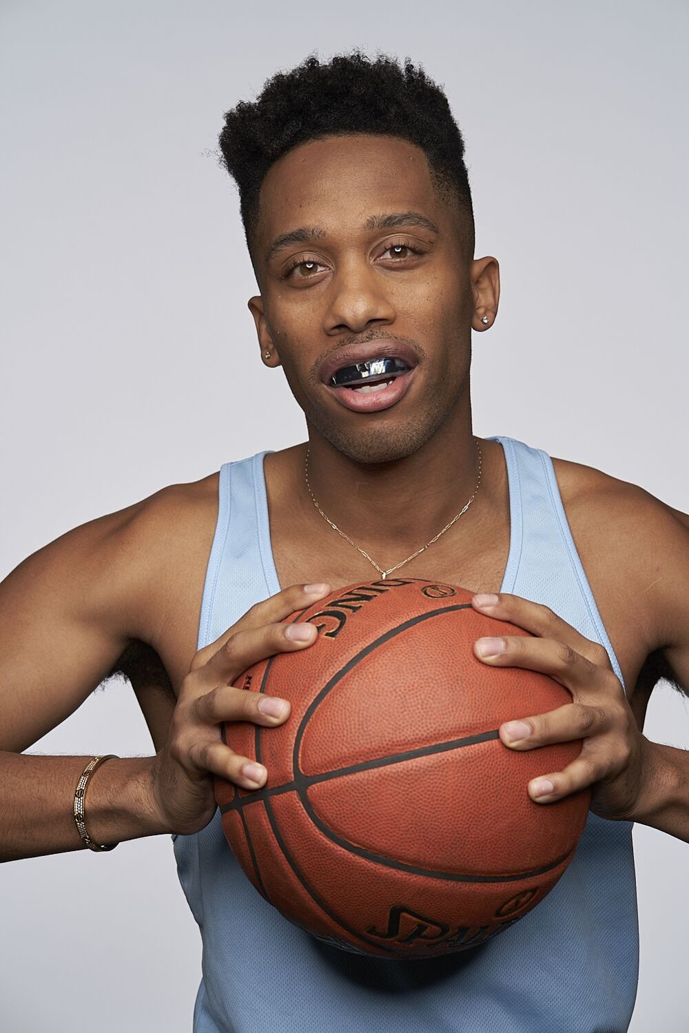 Athlete wearing the FITGuard smart mouthguard